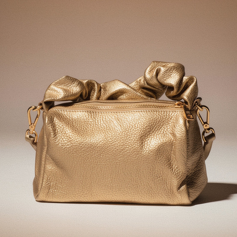 Bolso de mano metalizado dorado
